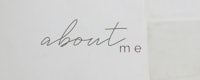 a white wall with the words about me written on it
